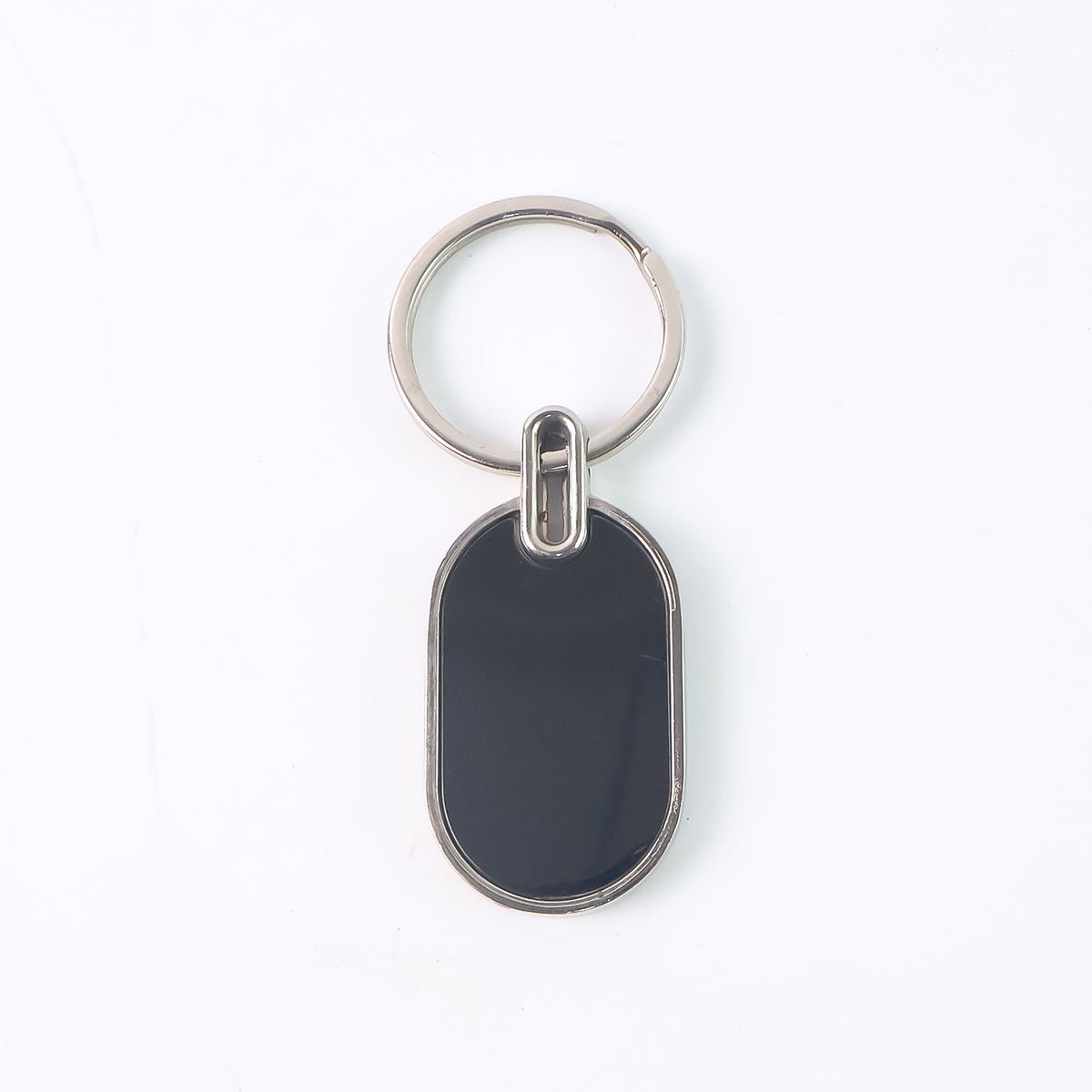 Oval Metal Keychain – Elegant Black & Silver Finish – side view