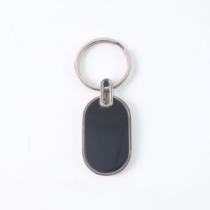 Oval Metal Keychain – Elegant Black & Silver Finish – side view