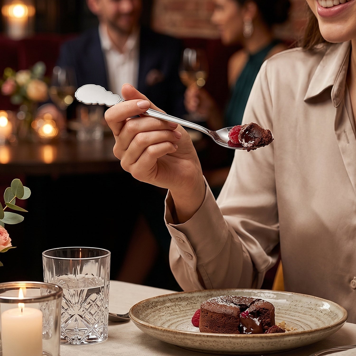 Stainless steel carved handle dinner spoon in use, scooping food during a meal.