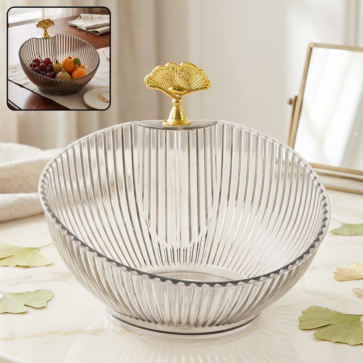 Stylish gold accent decorative plastic fruit bowl as a dining table centerpiece