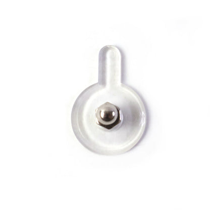 Adhesive wall hook being installed without nails