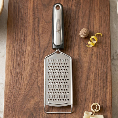 Steel grater ideal for vegetables, lemon zest, and spices