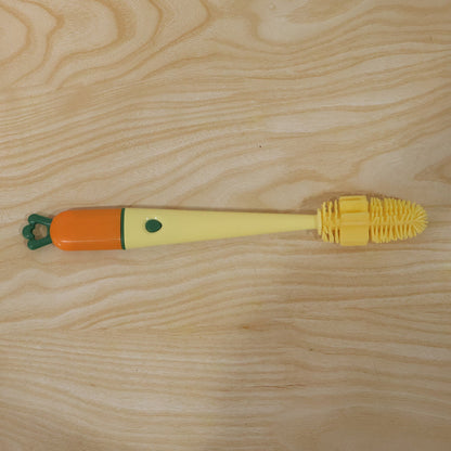 Packaged 3-in-1 bottle cleaning brush ready for use.