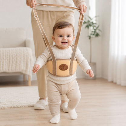 Baby walking support harness in a neutral colour for toddler first steps