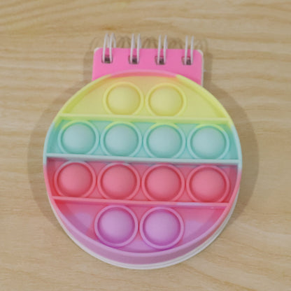 Fun rainbow silicone bubble notebook for boys and girls