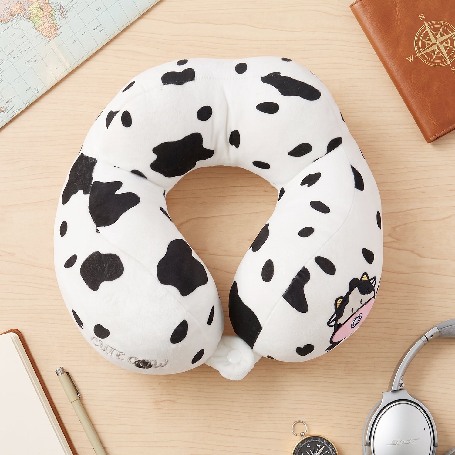 Soft plush cow pillow for flights, trains and road trips