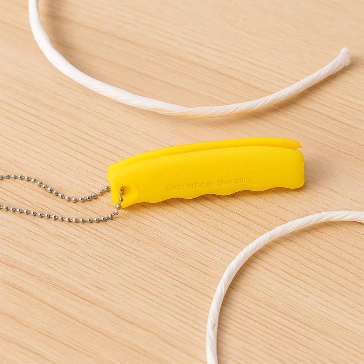 Silicone Bag Carrier – Comfort Grip & Keychain – close-up