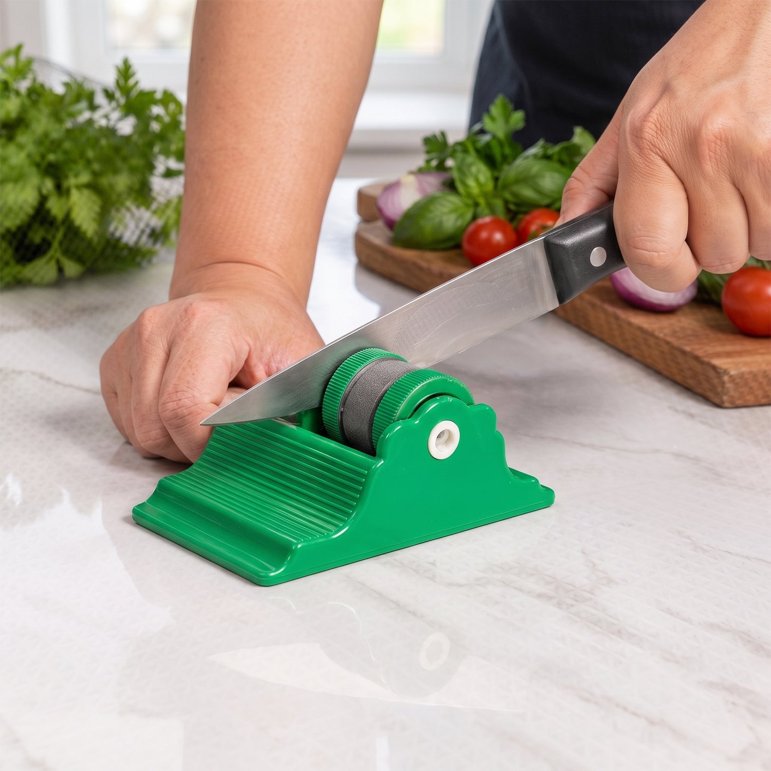 Easy grip knife sharpener with adhesive base for home kitchens