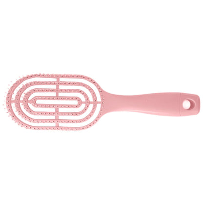 Men's hair brush held comfortably in hand, demonstrating easy grip.