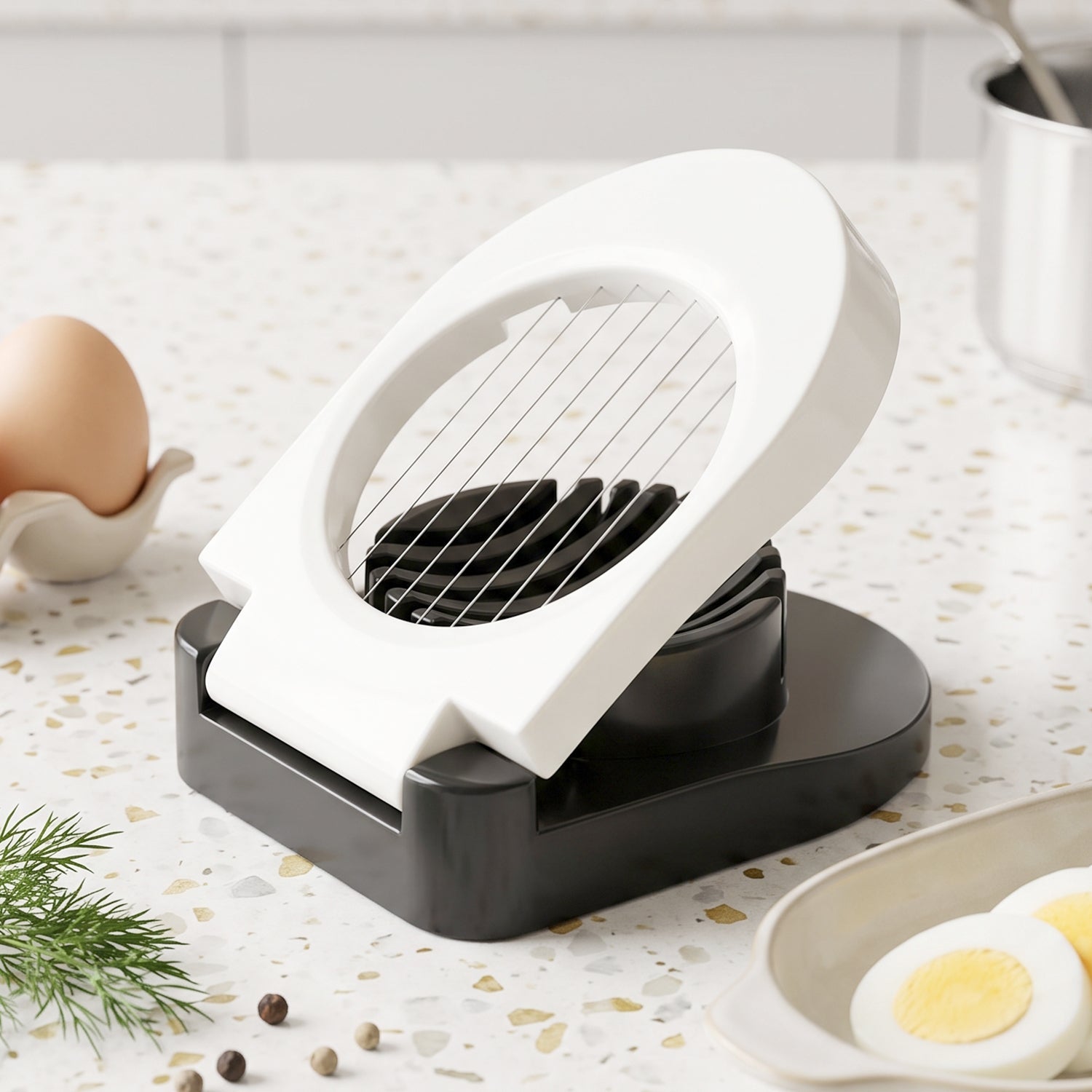 Compact wire egg cutter for salads and sandwiches