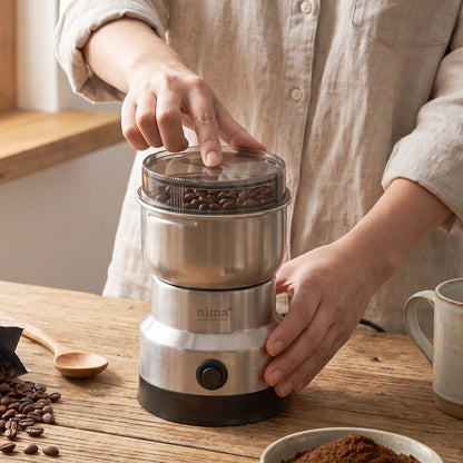 Portable electric masala grinder with stainless steel jar