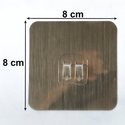 Compact 8x8 cm self-adhesive wall hook with metallic finish for modern home decor.