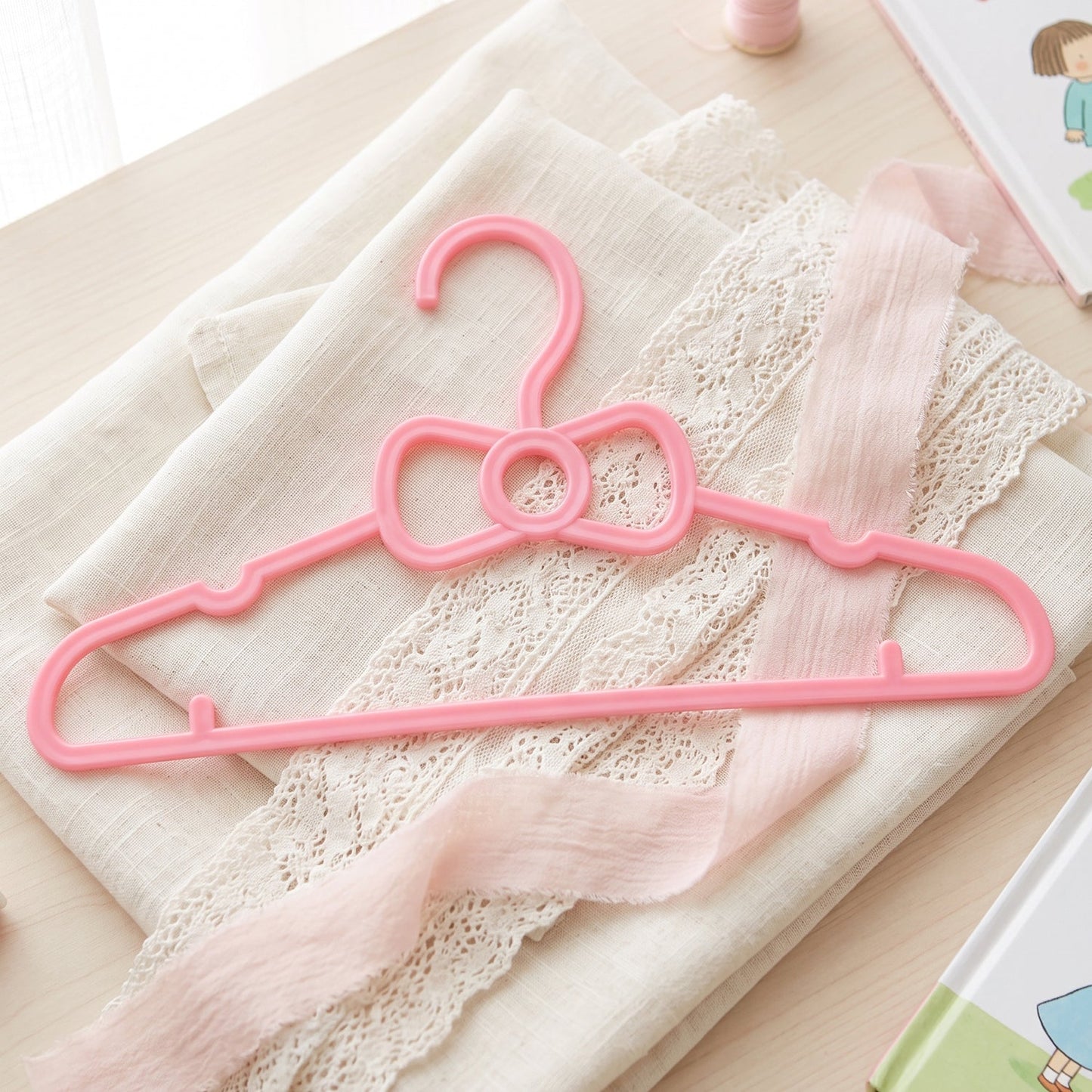 Children's wardrobe hangers with fun design for small garments