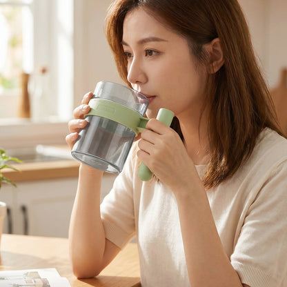 See through plastic cup with handle for tea, coffee and juice