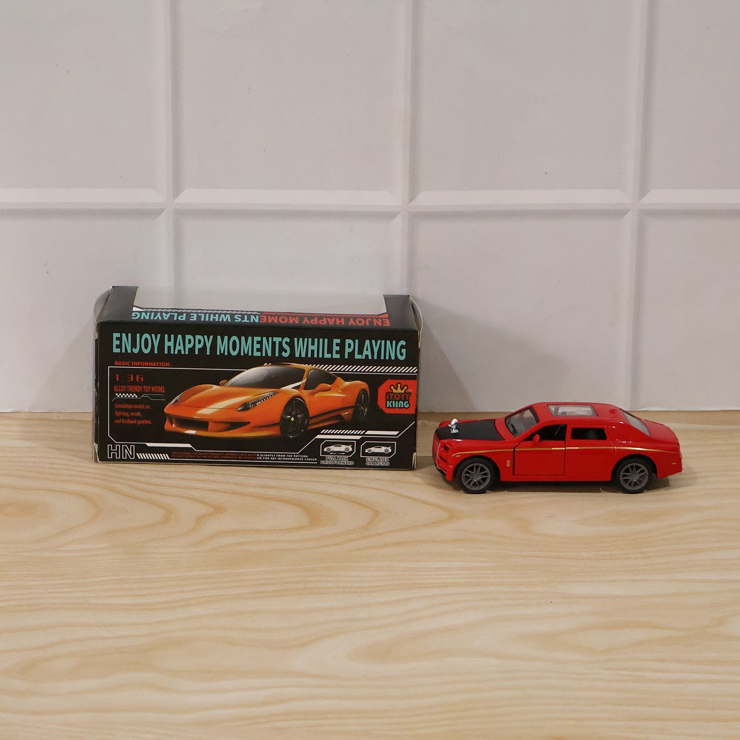 Kids play with miniature pull-back luxury toy car