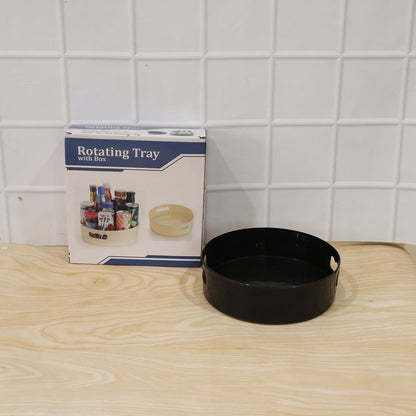 Everyday use of the rotating storage tray for kitchen essentials.