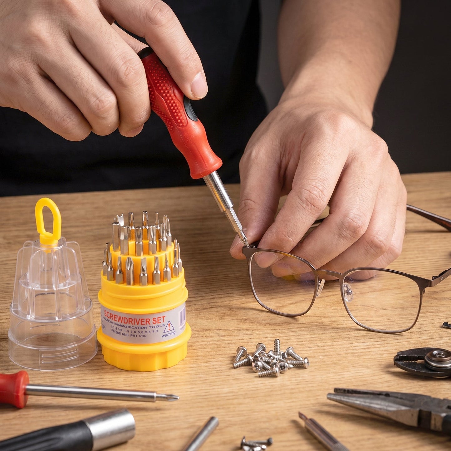 Screwdriver set with assorted bits for watches and devices