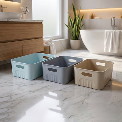 Three plastic storage baskets stacked neatly, demonstrating space-saving design.