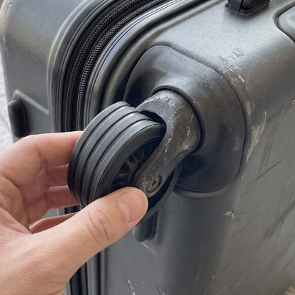 Noise reducing suitcase wheel covers for smooth, silent rolling