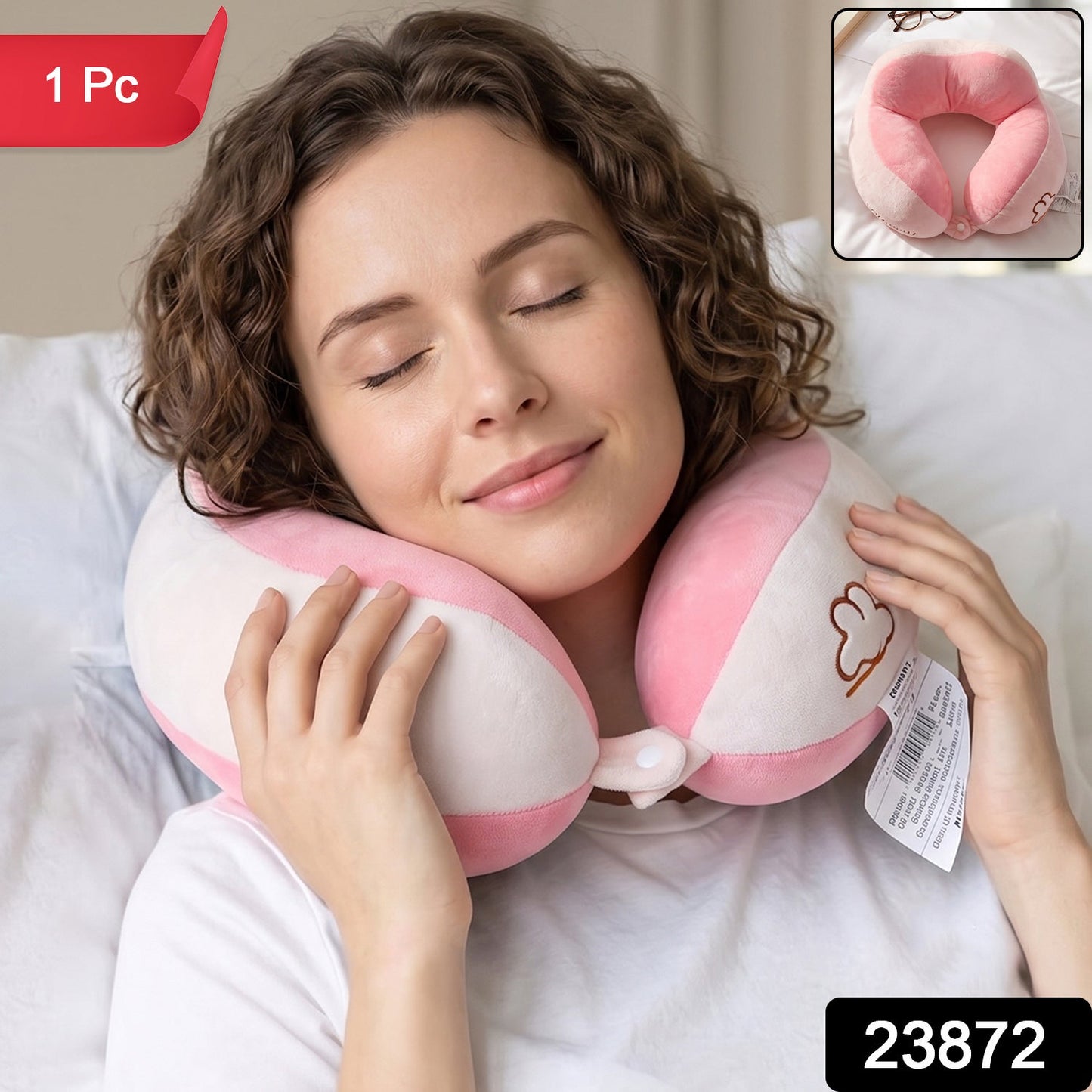 Soft plush pink and white U shaped pillow for travel comfort